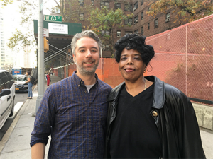 John Skies, Video Director with Gilda Menendez, PAN Grant Recipient smiling outside on sidewalk